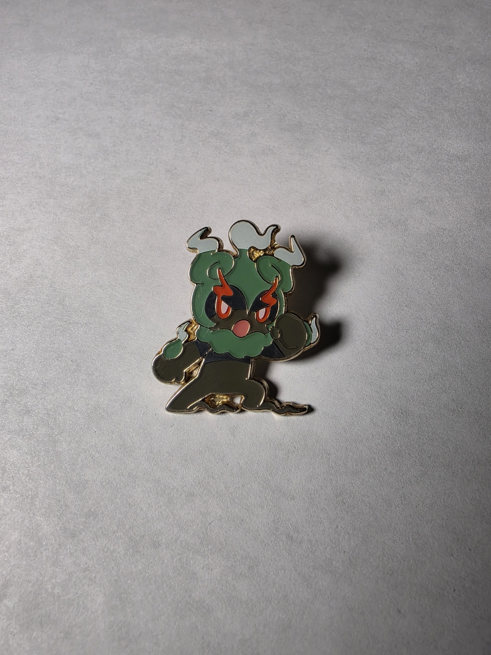 Pokemon Green Monster Pin with Red Accents - Kids Toys Trading Cards